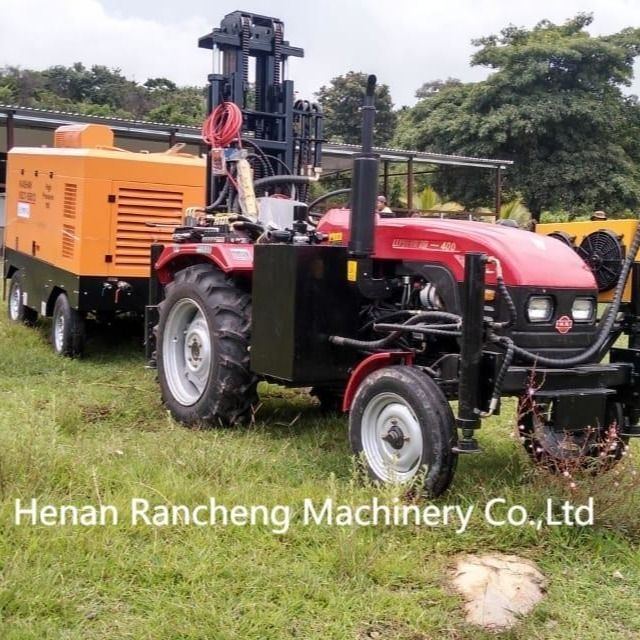 Machine de forage hydraulique de puits d'eau DTH 200m Tracteur pneumatique portable Forage monté